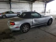✅ 1999 Mazda MX-5 Miata • VIN: JM1NB3530X0104289 • Лот: 82217305. Опубликован ранее на Copart с пробегом 150 760 миль. Бесплатный доступ к архиву аукционных продаж из США и подробный отчёт об истории автомобиля на DreamBid. Изображение 3.