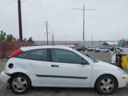 ✅ 2003 Ford Focus ZX3 • VIN: 3FAFP31Z23R147547 • Lot: 42426117. Listed on IAAI with 129,860 mi. Free auction sales archive from the USA and detailed vehicle history report at DreamBid. Image 12.