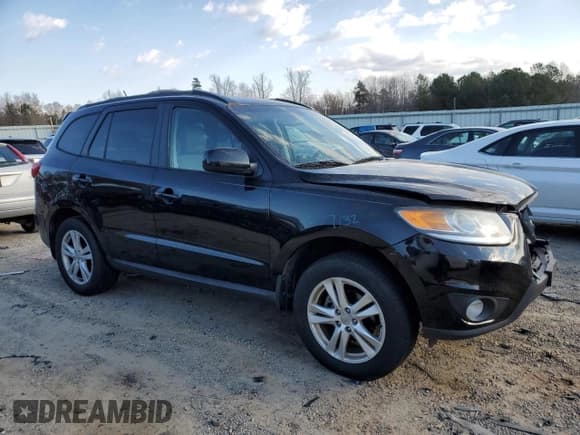 ✅ 2012 Hyundai Santa Fe SE • VIN: 5XYZH4AG1CG158882 • Lot: 82795534. Listed on Copart with 155,903 mi. Free auction sales archive from the USA and detailed vehicle history report at DreamBid. Image 4.