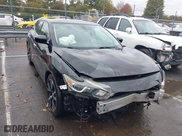 ✅ 2018 Nissan Maxima SL • VIN: 1N4AA6AP1JC396056 • Lot: 43557110. Wystawiony na IAAI z przebiegiem 122 919 mil. Bezpłatny archiwum sprzedaży aukcyjnych z USA i szczegółowy raport historii pojazdu na DreamBid. Zdjęcie 1.