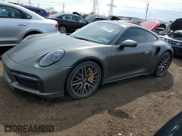 ✅ 2023 Porsche 911 Turbo • VIN: WP0AD2A99PS257416 • Lot: 54127325. Wystawiony na Copart z przebiegiem 7 252 mil. Bezpłatny archiwum sprzedaży aukcyjnych z USA i szczegółowy raport historii pojazdu na DreamBid. Zdjęcie 1.