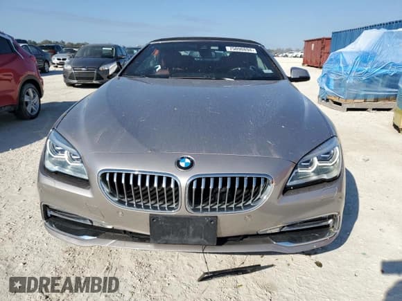 ✅ 2016 BMW 6 Series 650i xDrive • VIN: WBA6F7C58GD930527 • Лот: 75090894. Опубликован ранее на Copart с пробегом 25 200 миль. Бесплатный доступ к архиву аукционных продаж из США и подробный отчёт об истории автомобиля на DreamBid. Изображение 5.