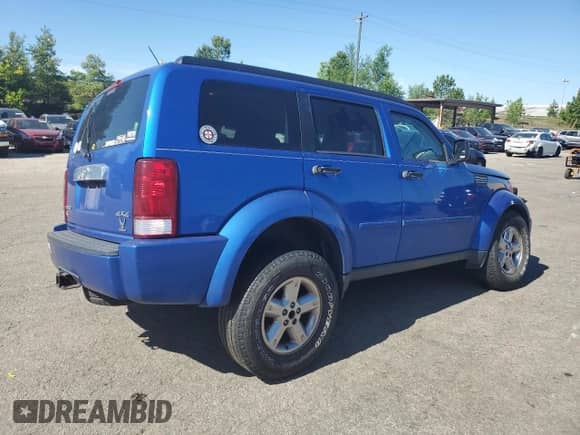2007 Dodge Nitro SLT с VIN 1D8GU58KX7W552040, выставлен на аукционе Copart как лот 56870334 с пробегом 235 985 миль миль и Списание • Salvage title. История ставок и продаж доступна на DreamBid. Изображение 3.