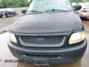 ✅ 1998 Ford F-150 • VIN: 1FTYF17W0WNC12927 • Lot: 42621641. Listed on IAAI with 251,079 mi. Free auction sales archive from the USA and detailed vehicle history report at DreamBid. Image 6.