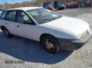✅ 1997 Saturn SW • VIN: 1G8ZH8284VZ234897 • Lot: 43595579. Listed on IAAI with 260,909 mi. Free auction sales archive from the USA and detailed vehicle history report at DreamBid. Image 1.