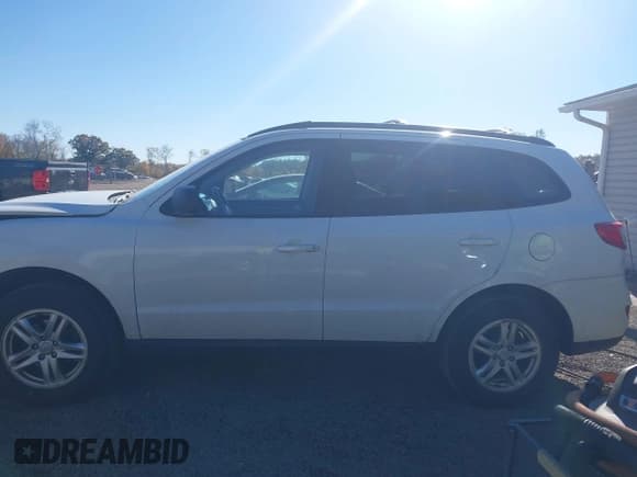 ✅ 2010 Hyundai Santa Fe GLS • VIN: 5NMSG3ABXAH389754 • Lot: 43557021. Listed on IAAI with 74,580 mi. Free auction sales archive from the USA and detailed vehicle history report at DreamBid. Image 14.