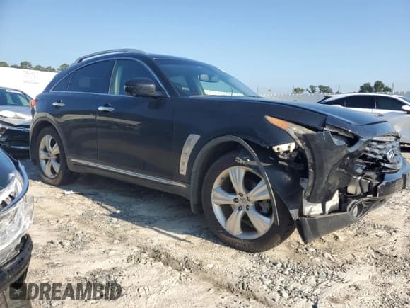 ✅ 2011 Infiniti FX • VIN: JN8AS1MW0BM732115 • Lot: 69354225. Listed on Copart with 208,332 mi. Free auction sales archive from the USA and detailed vehicle history report at DreamBid. Image 4.
