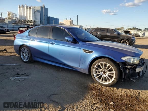 ✅ 2013 BMW M5 • VIN: WBSFV9C52DC773461 • Lot: 77375684. Listed on Copart with 90,641 mi. Free auction sales archive from the USA and detailed vehicle history report at DreamBid. Image 4.