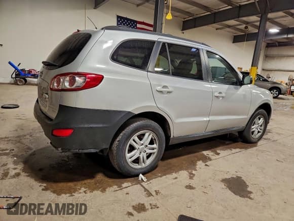 ✅ 2010 Hyundai Santa Fe GLS • VIN: 5NMSG3AB5AH414463 • Лот: 95239435. Опубликован ранее на Copart с пробегом 168 180 миль. Бесплатный доступ к архиву аукционных продаж из США и подробный отчёт об истории автомобиля на DreamBid. Изображение 3.