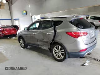 ✅ 2014 Hyundai Santa Fe • VIN: 5XYZU3LA6EG207690 • Лот: 63659934. Опубликован ранее на Copart с пробегом 76 843 миль. Бесплатный доступ к архиву аукционных продаж из США и подробный отчёт об истории автомобиля на DreamBid. Изображение 2.