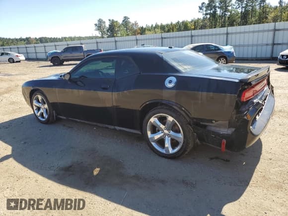 ✅ 2013 Dodge Challenger SXT • VIN: 2C3CDYAG0DH500287 • Lot: 76939094. Wystawiony na Copart z przebiegiem 220 127 mil. Bezpłatny archiwum sprzedaży aukcyjnych z USA i szczegółowy raport historii pojazdu na DreamBid. Zdjęcie 2.