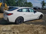 ✅ 2023 BMW i4 eDrive40 • VIN: WBY73AW04PFP24525 • Лот: 60928733. Опубликован ранее на Copart с пробегом 13 618 миль. Бесплатный доступ к архиву аукционных продаж из США и подробный отчёт об истории автомобиля на DreamBid. Изображение 3.