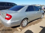 ✅ 2002 Toyota Camry LE • VIN: JTDBE32K520037087 • Lot: 43581793. Listed on IAAI with 216,243 mi. Free auction sales archive from the USA and detailed vehicle history report at DreamBid. Image 4.