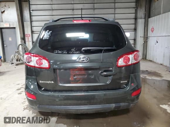 ✅ 2012 Hyundai Santa Fe GLS • VIN: 5XYZGDAB8CG130701 • Lot: 80709004. Listed on Copart with Not provided. Free auction sales archive from the USA and detailed vehicle history report at DreamBid. Image 6.