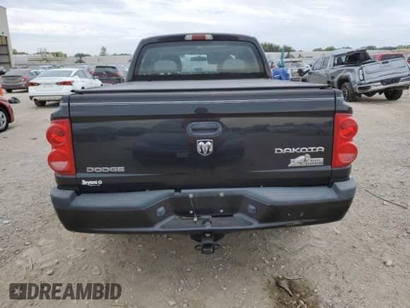 2010 Dodge Dakota Bighorn/Lonestar with VIN 1D7CW3GK5AS173187, listed as a Copart auction lot 68610854 with 192,017 mi miles and Salvage title. Bid and sale history available at DreamBid. Image 6.