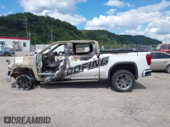 ✅ 2023 GMC Sierra 1500 Denali Ultimate • VIN: 1GTUUHEL7PZ243463 • Лот: 43086884. Опубликован ранее на IAAI с пробегом 64 717 миль. Бесплатный доступ к архиву аукционных продаж из США и подробный отчёт об истории автомобиля на DreamBid. Изображение 13.