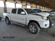 ✅ 2015 Toyota Tacoma PreRunner • VIN: 3TMJU4GNXFM175959 • Lot: 57895825. Listed on Copart with 157,955 mi. Free auction sales archive from the USA and detailed vehicle history report at DreamBid. Image 4.