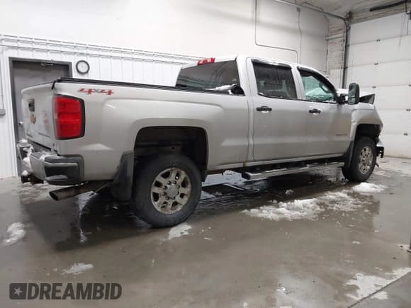 ✅ 2015 Chevrolet Silverado 2500HD LT • VIN: 1GC1KVEG0FF128133 • Lot: 43741035. Listed on IAAI with 47,650 mi. Free auction sales archive from the USA and detailed vehicle history report at DreamBid. Image 4.