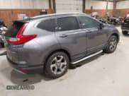 ✅ 2018 Honda CR-V EX-L • VIN: 2HKRW2H84JH612783 • Lot: 43574561. Listed on IAAI with 68,770 mi. Free auction sales archive from the USA and detailed vehicle history report at DreamBid. Image 4.