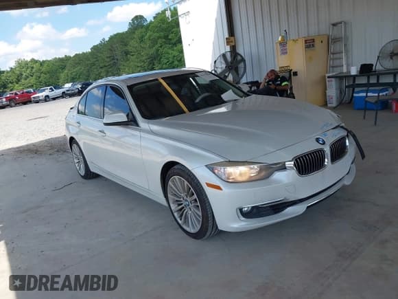 ✅ 2013 BMW 3 Series 328i • VIN: WBA3A5G58DNP19818 • Lot: 42315026. Listed on IAAI with 133,510 mi. Free auction sales archive from the USA and detailed vehicle history report at DreamBid. Image 1.
