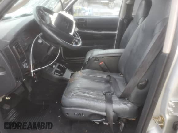 2003 Dodge Dakota Sport z VIN 1D7HG38N83S265442, wystawiony jako Copart lot #84969985 z przebiegiem Nie podano mil oraz Szkoda całkowita • Salvage title. Historia ofert i sprzedaży dostępna na DreamBid. Obrazek 7.