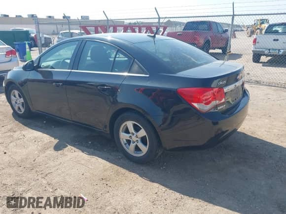 2014 Chevrolet Cruze 1LT with VIN 1G1PC5SB6E7465214, listed as a IAAI auction lot 43358660 with 99,999 mi miles and . Bid and sale history available at DreamBid. Image 3.