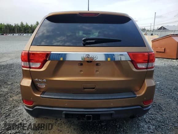 ✅ 2011 Jeep Grand Cherokee Laredo • VIN: 1J4RR4GGXBC697695 • Lot: 59696055. Listed on Copart with 148,537 mi. Free auction sales archive from the USA and detailed vehicle history report at DreamBid. Image 6.