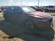 ✅ 2016 Ford Taurus SHO • VIN: 1FAHP2KT6GG140921 • Lot: 52118935. Listed on Copart with 132,199 mi. Free auction sales archive from the USA and detailed vehicle history report at DreamBid. Image 4.