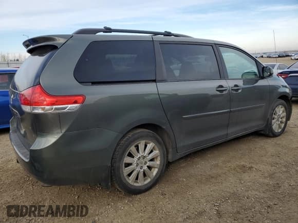 ✅ 2012 Toyota Sienna LE • VIN: 5TDJK3DC7CS039741 • Lot: 91675575. Listed on Copart with 215,437 mi. Free auction sales archive from the USA and detailed vehicle history report at DreamBid. Image 3.