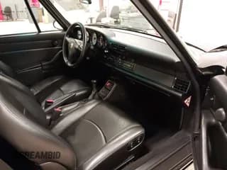 ✅ 1997 Porsche 911 • VIN: WP0AA2992VS321001 • Лот: 42256441. Опубликован ранее на IAAI с пробегом 56 949 миль. Бесплатный доступ к архиву аукционных продаж из США и подробный отчёт об истории автомобиля на DreamBid. Изображение 5.