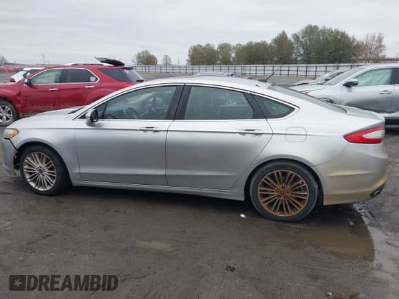 ✅ 2016 Ford Fusion SE • VIN: 3FA6P0H91GR155925 • Lot: 43828321. Listed on IAAI with 245,423 mi. Free auction sales archive from the USA and detailed vehicle history report at DreamBid. Image 14.