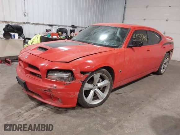 2009 Dodge Charger SRT-8 с VIN 2B3LA73W59H598180, выставлен на аукционе IAAI как лот 41392102 с пробегом Не указан миль и . История ставок и продаж доступна на DreamBid. Изображение 2.