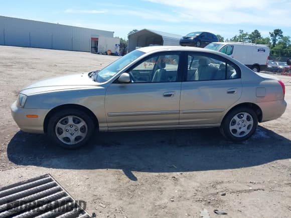 ✅ 2003 Hyundai Elantra GLS • VIN: KMHDN45D63U663572 • Lot: 42464303. Wystawiony na IAAI z przebiegiem 126 747 mil. Bezpłatny archiwum sprzedaży aukcyjnych z USA i szczegółowy raport historii pojazdu na DreamBid. Zdjęcie 14.