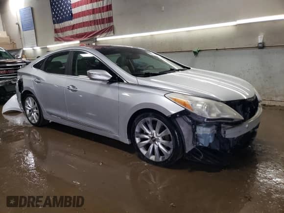 2012 Hyundai Azera с VIN KMHFH4JG6CA150808, выставлен на аукционе Copart как лот 46639735 с пробегом 100 089 миль миль и Списание • Salvage title. История ставок и продаж доступна на DreamBid. Изображение 4.