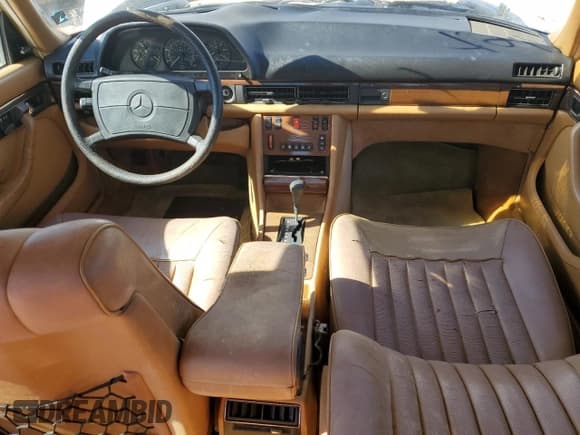 ✅ 1987 Mercedes-Benz 300 SDL • VIN: WDBCB25D7HA312660 • Lot: 91036315. Wystawiony na Copart z przebiegiem 58 515 mil. Bezpłatny archiwum sprzedaży aukcyjnych z USA i szczegółowy raport historii pojazdu na DreamBid. Zdjęcie 8.
