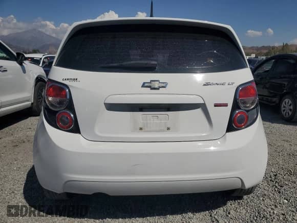 2013 Chevrolet Sonic LT with VIN 1G1JC6SB0D4108171, listed as a Copart auction lot 71726095 with 119,920 mi miles and Clean title. Bid and sale history available at DreamBid. Image 6.