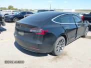 ✅ 2019 Tesla Model 3 Mid Range • VIN: 5YJ3E1EA2KF395261 • Lot: 43400329. Listed on IAAI with 113,981 mi. Free auction sales archive from the USA and detailed vehicle history report at DreamBid. Image 4.