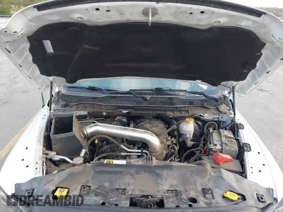 2019 Ram 1500 SLT z VIN 1C6RR6GG6KS670072, wystawiony jako IAAI lot #43225321 z przebiegiem 100 246 mil mil oraz . Historia ofert i sprzedaży dostępna na DreamBid. Obrazek 10.