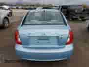 2010 Hyundai Accent GL with VIN KMHCN4BC9AU394049, listed as a Copart auction lot 86221915 with 235,404 mi miles and Clean title. Bid and sale history available at DreamBid. Image 6.