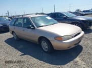 ✅ 1998 Ford Escort SE • VIN: 3FAFP15P6WR226401 • Lot: 42410303. Listed on IAAI with 215,518 mi. Free auction sales archive from the USA and detailed vehicle history report at DreamBid. Image 1.