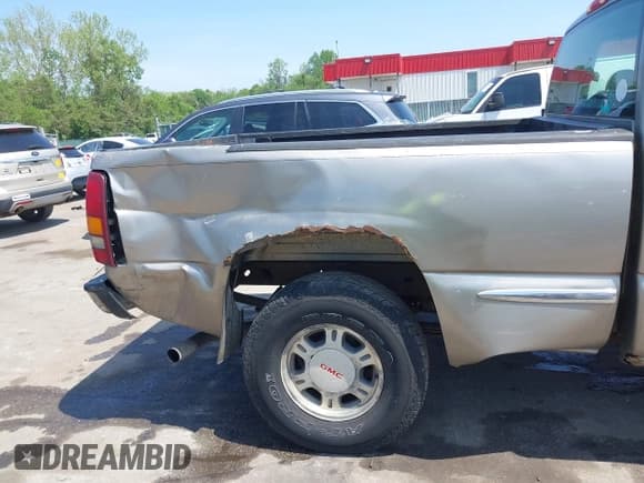 ✅ 2001 GMC Sierra 1500 SLE • VIN: 1GTEK19T31E271805 • Лот: 42167399. Опубликован ранее на IAAI с пробегом 206 202 миль. Бесплатный доступ к архиву аукционных продаж из США и подробный отчёт об истории автомобиля на DreamBid. Изображение 17.