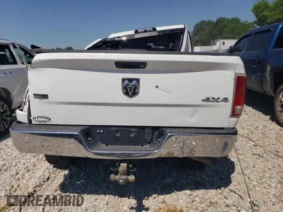 ✅ 2018 Ram 2500 Laramie • VIN: 3C6UR5NJ3JG252142 • Lot: 58724454. Listed on Copart with 99,079 mi. Free auction sales archive from the USA and detailed vehicle history report at DreamBid. Image 6.