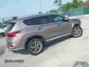 2019 Hyundai Santa Fe Ultimate z VIN 5NMS53AD8KH061810, wystawiony jako IAAI lot #42481330 z przebiegiem 96 030 mil mil oraz . Historia ofert i sprzedaży dostępna na DreamBid. Obrazek 4.