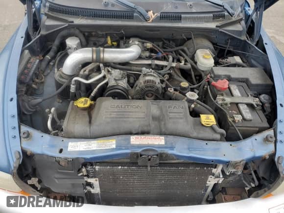 2004 Dodge Dakota SLT z VIN 1D7HG48K04S739865, wystawiony jako Copart lot #57867265 z przebiegiem 214 698 mil mil oraz Czysty tytuł • Clean title. Historia ofert i sprzedaży dostępna na DreamBid. Obrazek 11.