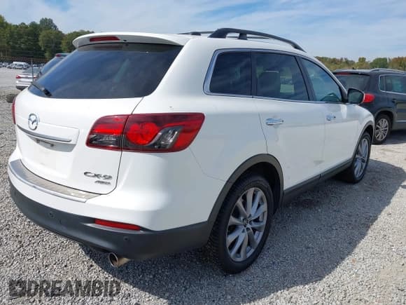 ✅ 2015 Mazda CX-9 Grand Touring • VIN: JM3TB3DA4F0460029 • Lot: 43481240. Wystawiony na IAAI z przebiegiem 161 434 mil. Bezpłatny archiwum sprzedaży aukcyjnych z USA i szczegółowy raport historii pojazdu na DreamBid. Zdjęcie 4.