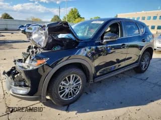 ✅ 2020 Mazda CX-5 Touring • VIN: JM3KFBCMXL0834113 • Lot: 85303205. Wystawiony na Copart z przebiegiem 79 811 mil. Bezpłatny archiwum sprzedaży aukcyjnych z USA i szczegółowy raport historii pojazdu na DreamBid. Zdjęcie 1.