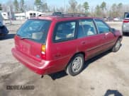 ✅ 1997 Ford Escort • VIN: 1FALP15P4VW104389 • Lot: 41510223. Listed on IAAI with 84,970 mi. Free auction sales archive from the USA and detailed vehicle history report at DreamBid. Image 4.