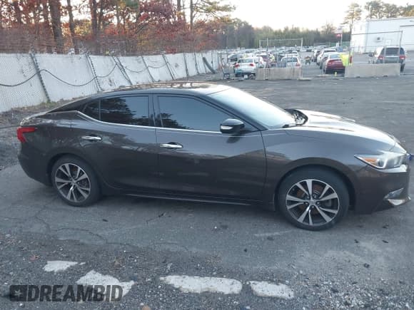 ✅ 2016 Nissan Maxima Platinum • VIN: 1N4AA6AP9GC405420 • Лот: 41121830. Опубликован ранее на IAAI с пробегом 59 680 миль. Бесплатный доступ к архиву аукционных продаж из США и подробный отчёт об истории автомобиля на DreamBid. Изображение 13.