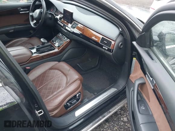 ✅ 2014 Audi A8 3.0L TDI • VIN: WAURMAFD0EN002589 • Lot: 43514466. Listed on IAAI with 62,587 mi. Free auction sales archive from the USA and detailed vehicle history report at DreamBid. Image 5.