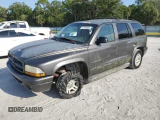 ✅ 2001 Dodge Durango • VIN: 1B4HR28N31F611110 • Лот: 57524805. Опубликован ранее на Copart с пробегом 185 731 миль. Бесплатный доступ к архиву аукционных продаж из США и подробный отчёт об истории автомобиля на DreamBid. Изображение 1.